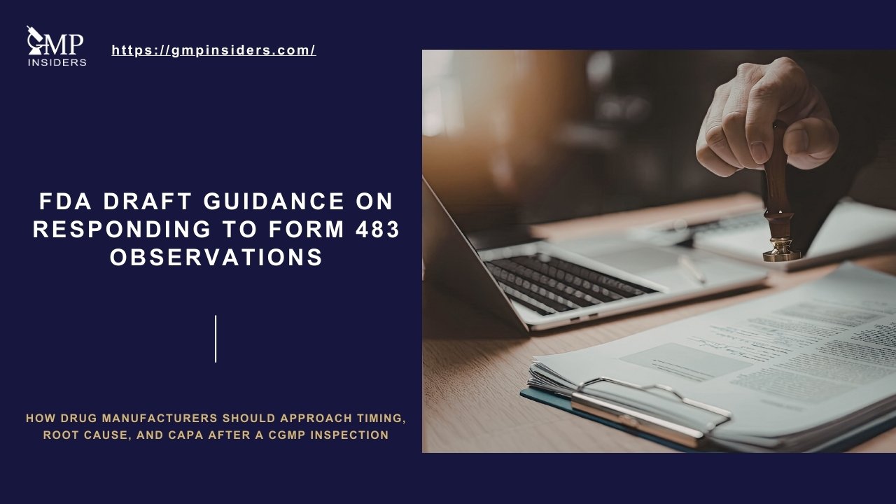 Featured image for GMP Insiders article on FDA draft guidance for responding to Form 483 observations, showing a hand stamping a document beside a laptop.