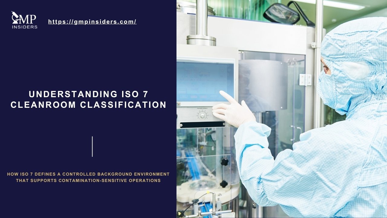 Technician operating equipment in an ISO 7 cleanroom during contamination-sensitive manufacturing.